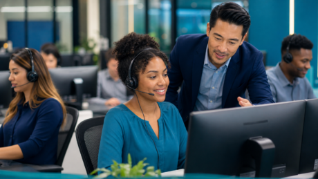 Customer service representative receiving professional call-center coaching